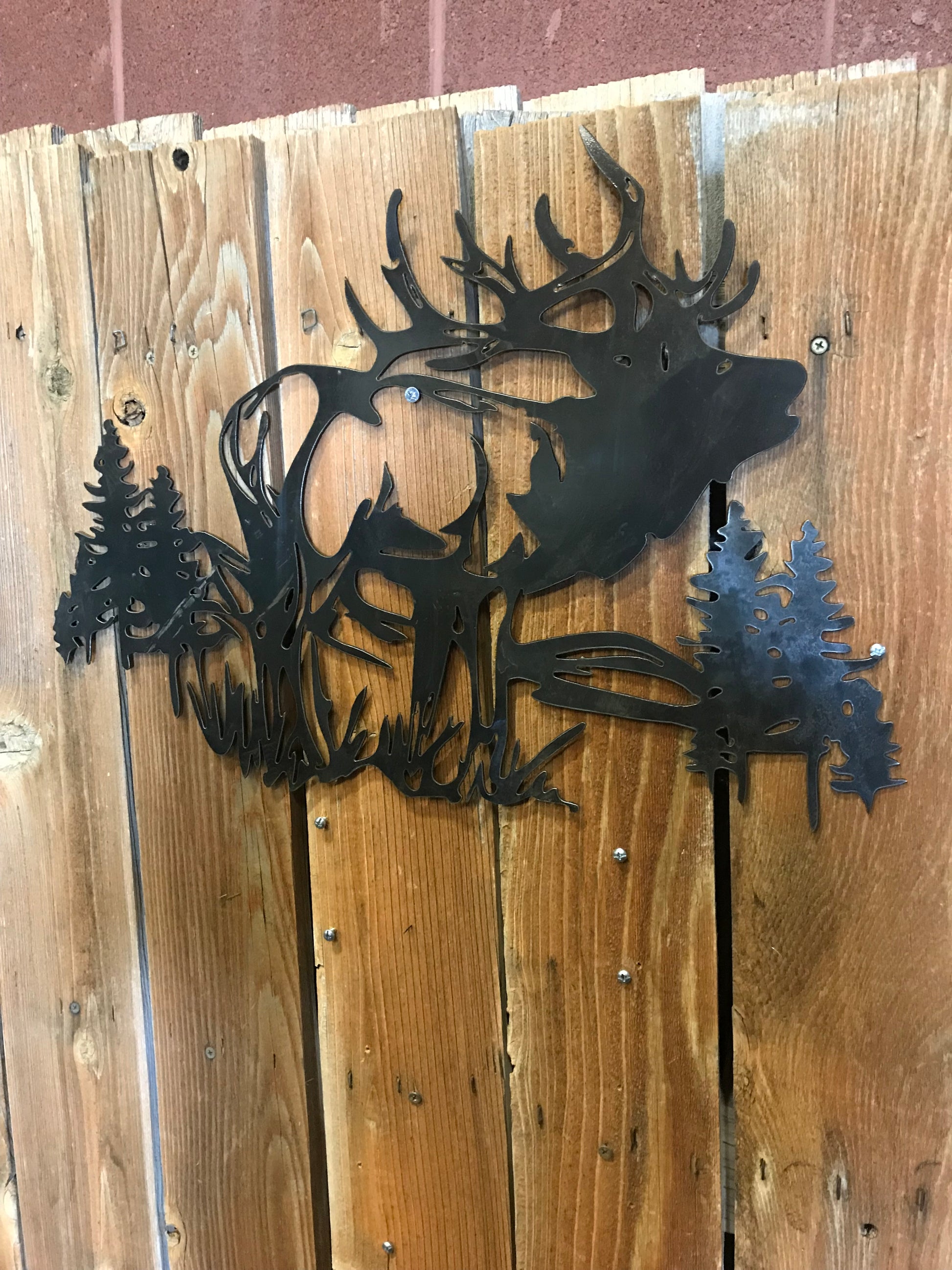 Steel Elk Scene on Wood Fence